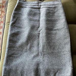Number two pencil skirt in wool blend. Grey and black tweed fabric. Size 8.